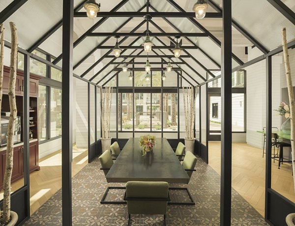 Modern clubhouse with sleek furnishings at The Tyler Apartments, offering luxury amenities in a vibrant urban setting