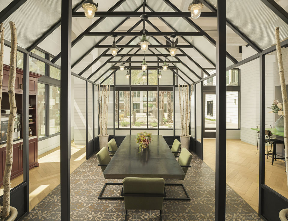 Modern clubhouse with sleek furnishings at The Tyler Apartments, offering luxury amenities in a vibrant urban setting