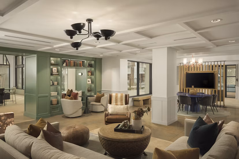 Clubhouse featuring modern design and cozy seating at The Tyler Apartments in downtown Greystar luxury community