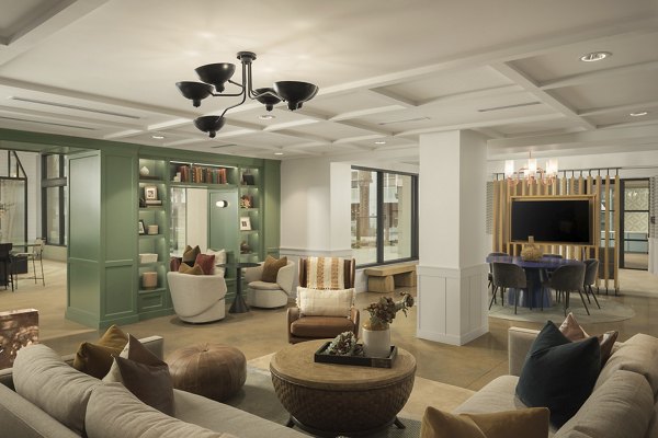 Clubhouse featuring modern design and cozy seating at The Tyler Apartments in downtown Greystar luxury community