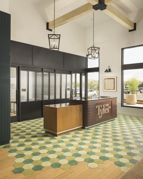Clubhouse with modern design and stylish interiors at The Tyler Apartments in Dallas Luxurious community space for residents to gather and relax
