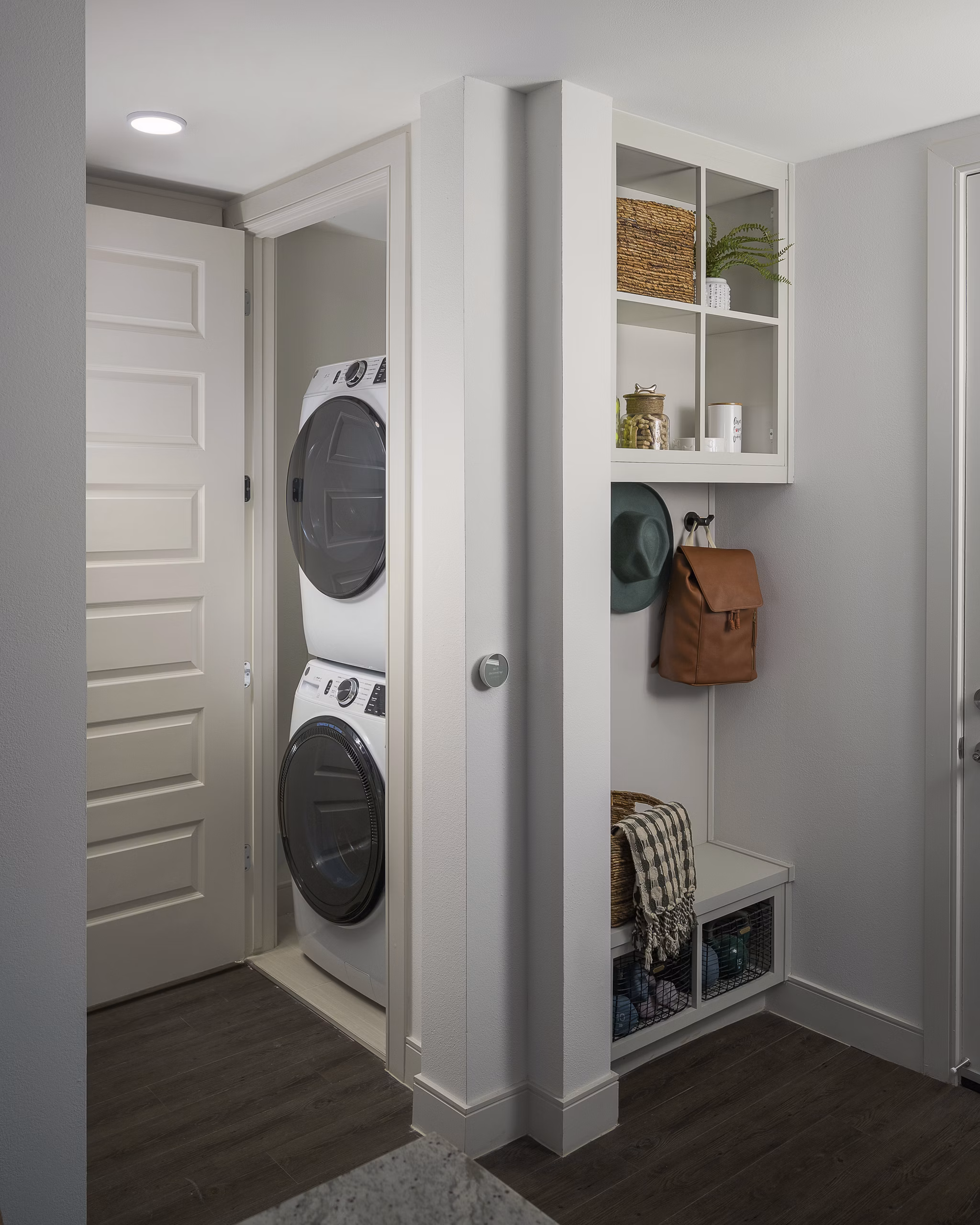 Laundry room with modern appliances at The Tyler Apartments in luxury Greystar community