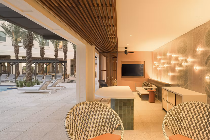 Cozy outdoor patio with stylish seating at The Tyler Apartments