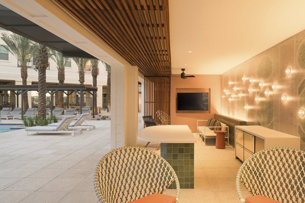Cozy outdoor patio with stylish seating at The Tyler Apartments