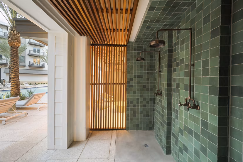 The Tyler Apartments: Serenity in landscaped courtyard featuring seating areas