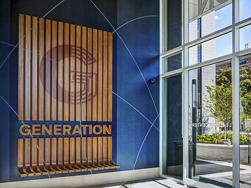 Clubhouse featuring modern design and cozy seating areas at Generation Atlanta Apartments