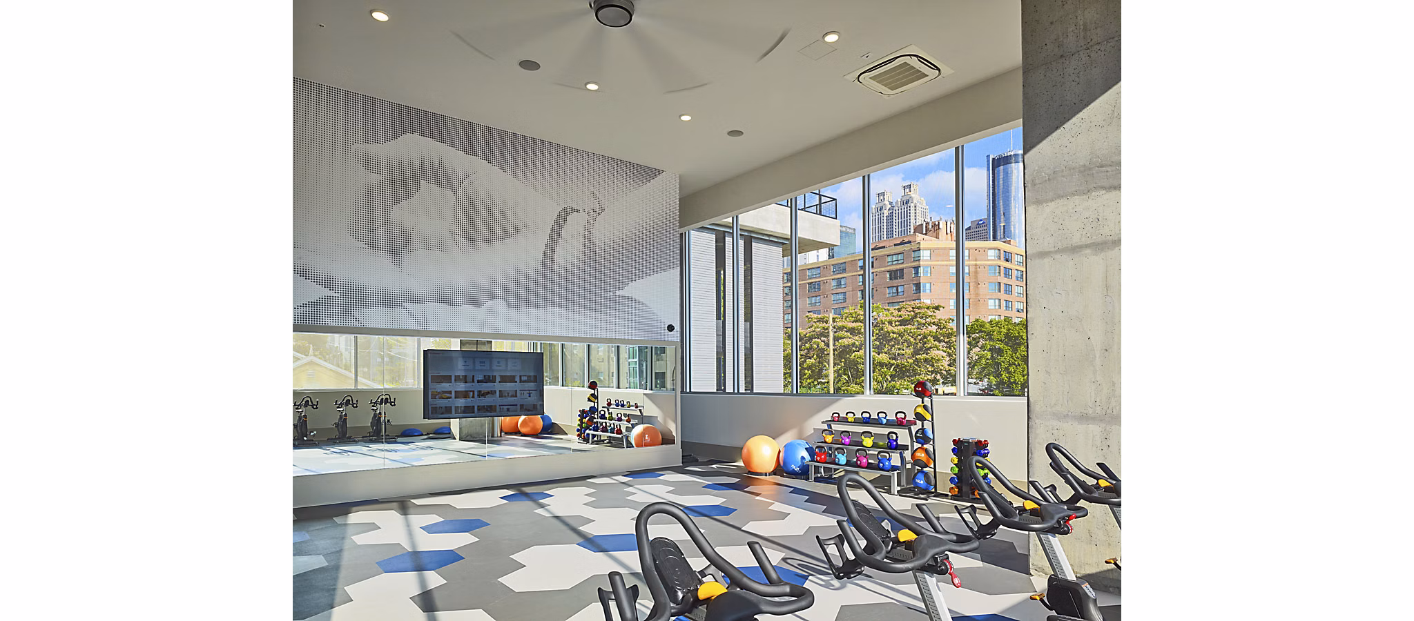 Modern fitness center with state-of-the-art equipment at Generation Atlanta Apartments