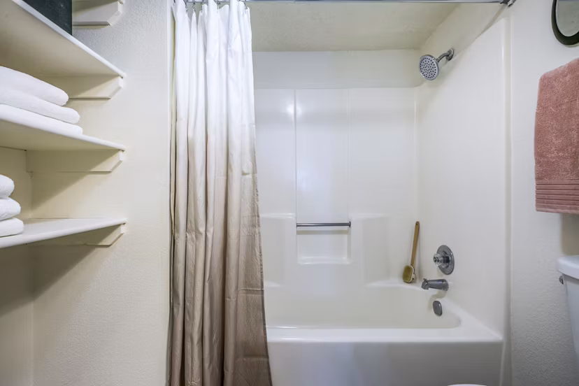 Modern bathroom with sleek fixtures and marble countertops at Stride West Apartments, a luxury living space in a prime location