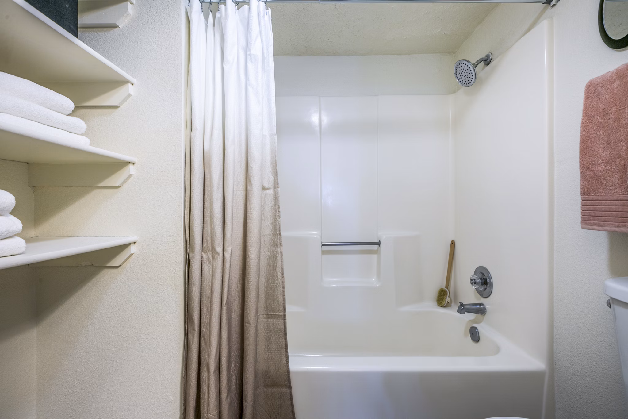 Modern bathroom with sleek fixtures and marble countertops at Stride West Apartments, a luxury living space in a prime location