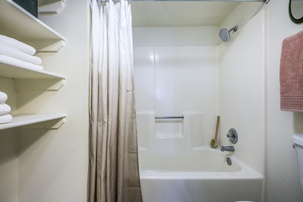 Modern bathroom with sleek fixtures and marble countertops at Stride West Apartments, a luxury living space in a prime location