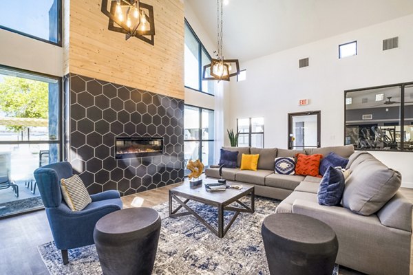 Modern clubhouse with sleek decor at Stride West Apartments, offering luxury amenities for residents