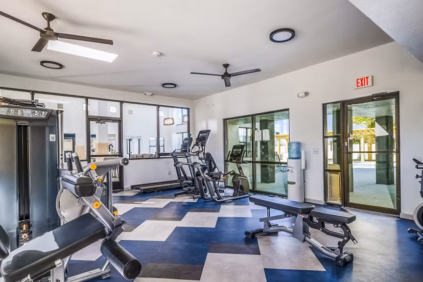 Fitness center with modern equipment at Stride West Apartments, perfect for an active lifestyle