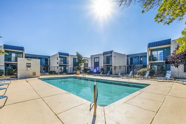 Crystal-clear swimming pool at Stride West Apartments, offering a luxury outdoor experience in top-rated Greystar community