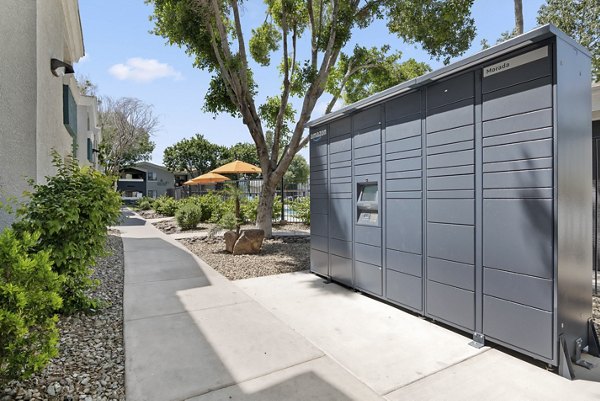 Mail room with modern design and secure package lockers at Morada Grande Apartments