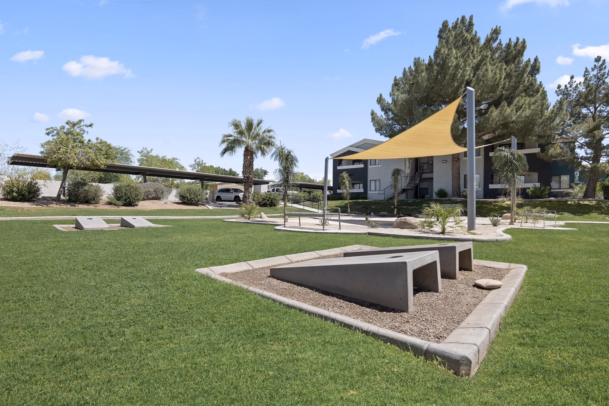 Serene courtyard with lush landscaping at Morada Grande Apartments