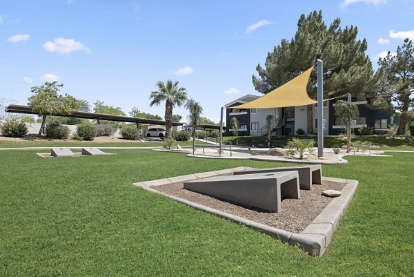 Serene courtyard with lush landscaping at Morada Grande Apartments