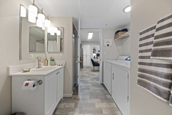 bath and laundry room at Morada Sky Apartments