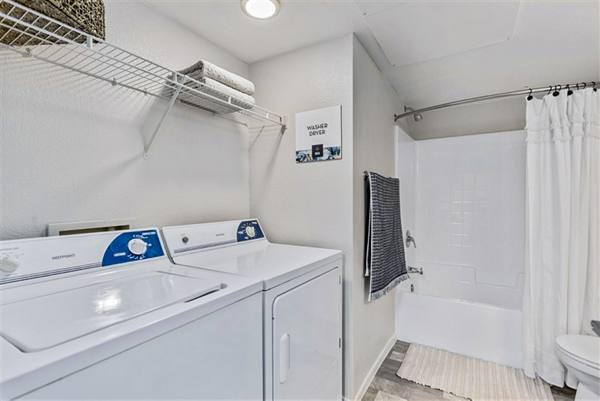 bath and laundry room at Morada Sky Apartments