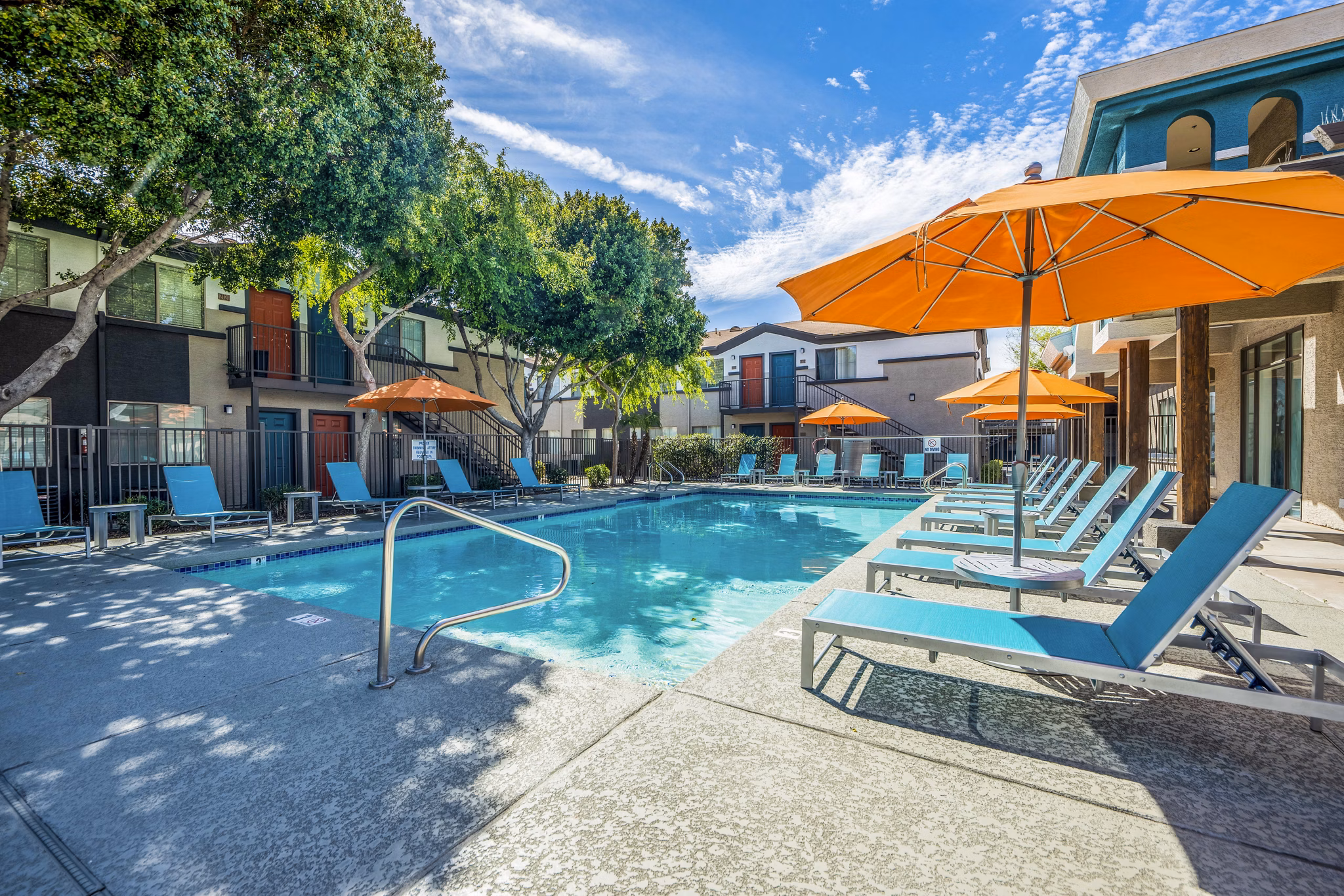 Luxurious rooftop pool with panoramic skyline views at Morada Sky Apartments