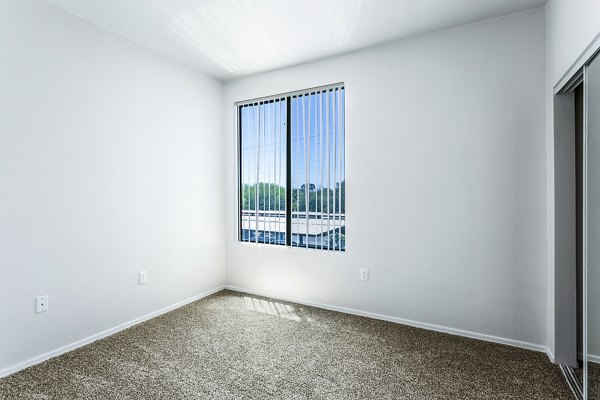 bedroom at The Urban Apartments