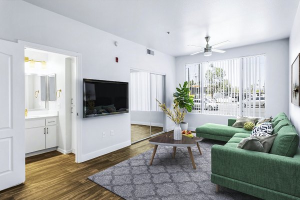 Contemporary living room with modern decor at The Urban Apartments in downtown, showcasing luxury apartment style