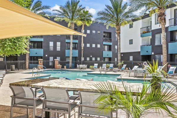 Rooftop pool with skyline views at The Urban Apartments, luxury living by Greystar