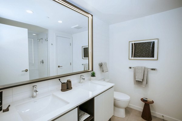 Modern bathroom with sleek fixtures at REN Apartments