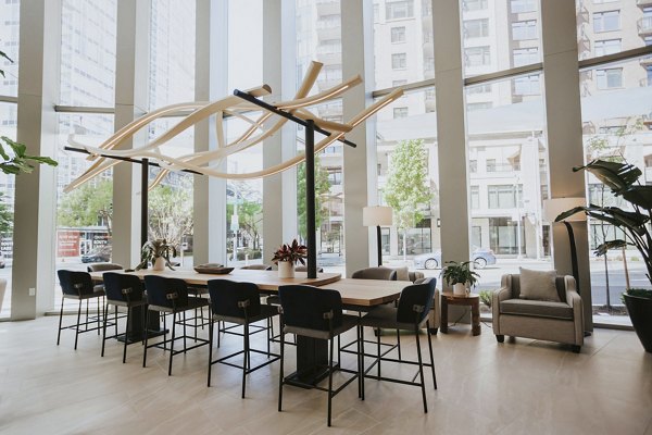 Clubhouse featuring contemporary design and plush seating at REN Apartments with Greystar's luxury apartment amenities