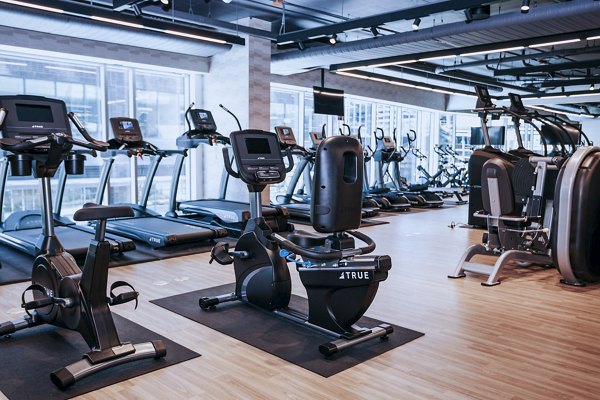 State-of-the-art fitness center with modern equipment at REN Apartments, luxury living in the heart of the city