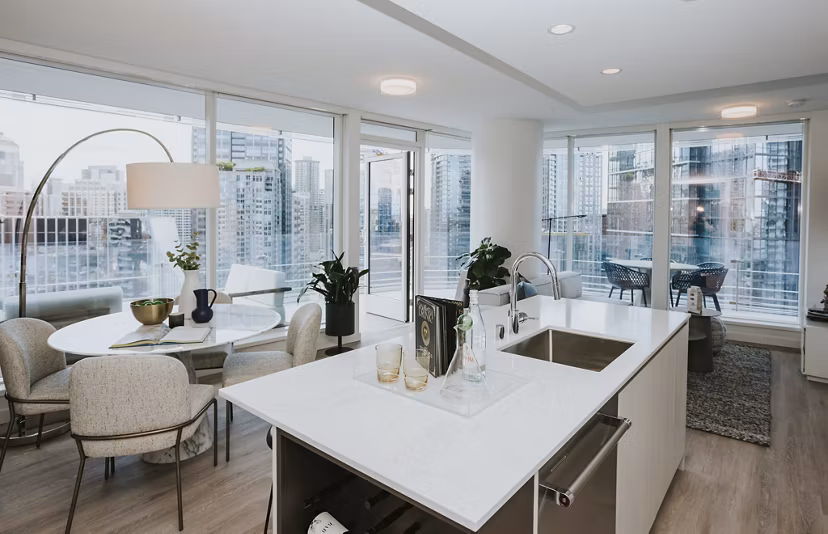 Modern kitchen featuring stainless steel appliances in REN Apartments