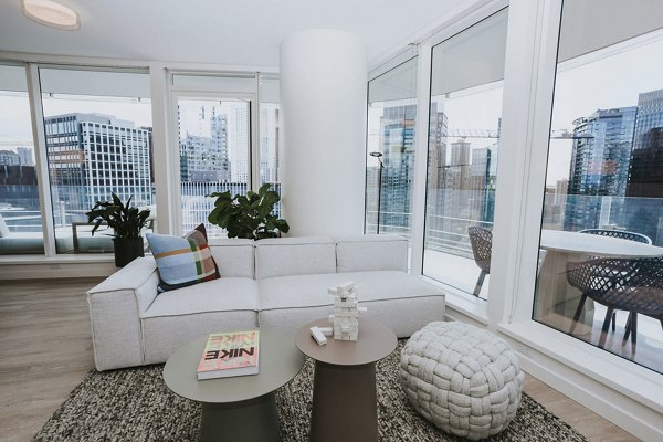 Spacious living room with modern decor at REN Apartments