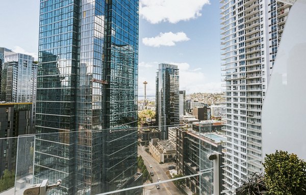 Private balcony with city views at REN Apartments, luxury living space in an urban setting