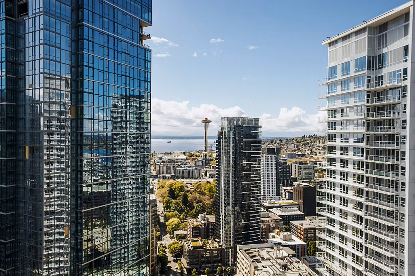 REN Apartments: Sleek modern high-rise in vibrant cityscape