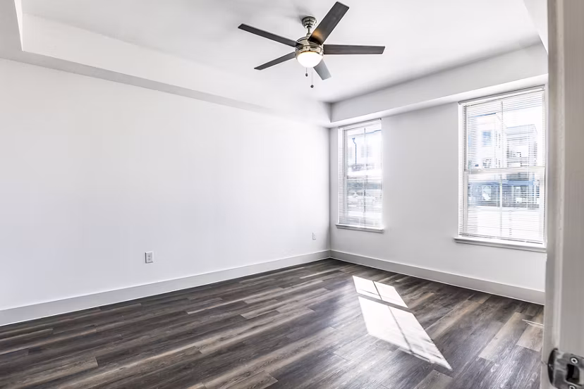 Cozy bedroom with modern decor at Nexus at Goodnight Ranch Apartments