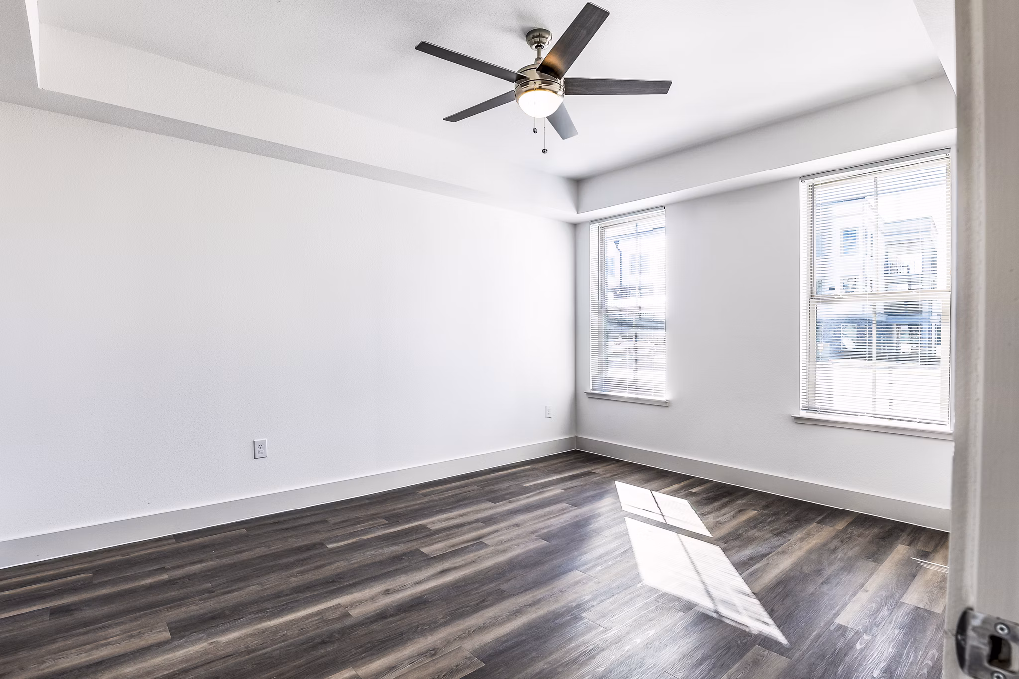 Cozy bedroom with modern decor at Nexus at Goodnight Ranch Apartments