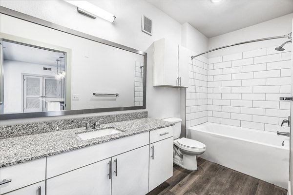 Modern bathroom with sleek fixtures at Nexus at Goodnight Ranch Apartments