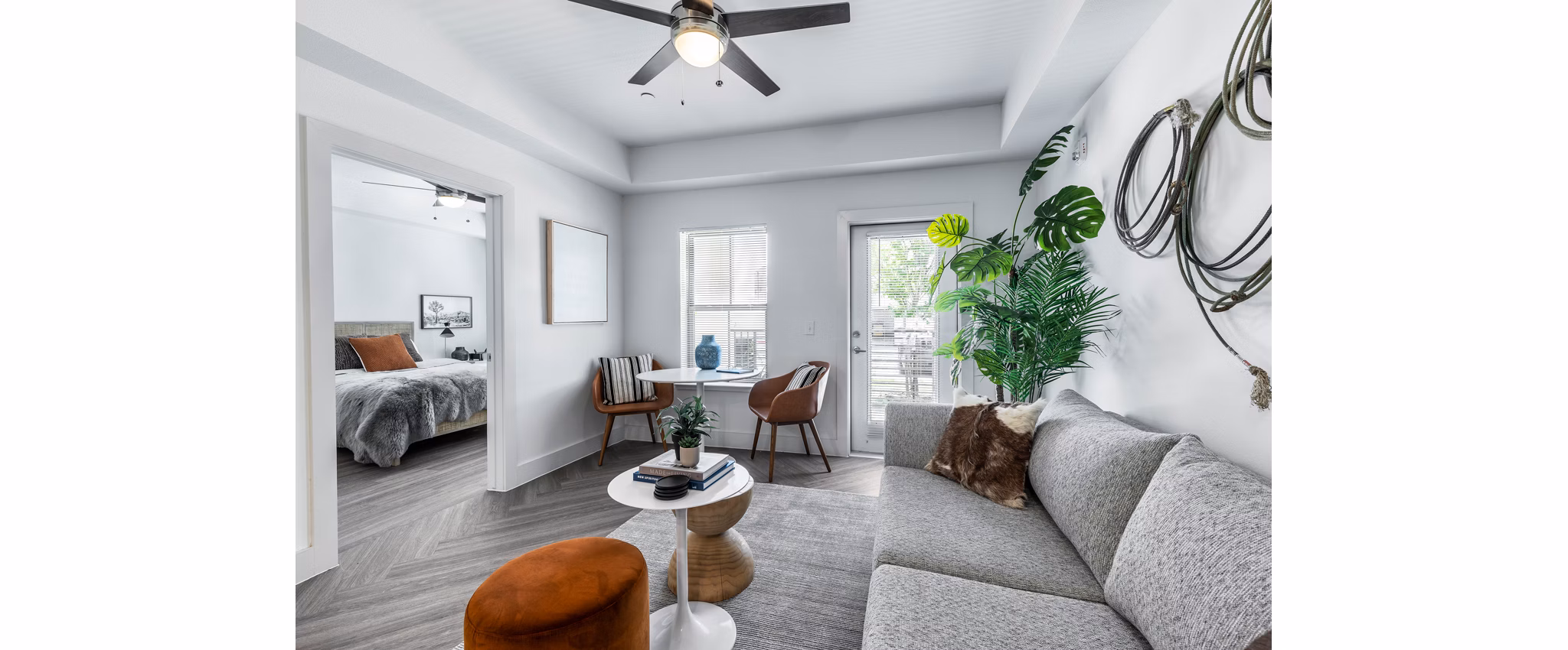 Spacious living room with modern decor at Nexus at Goodnight Ranch Apartments