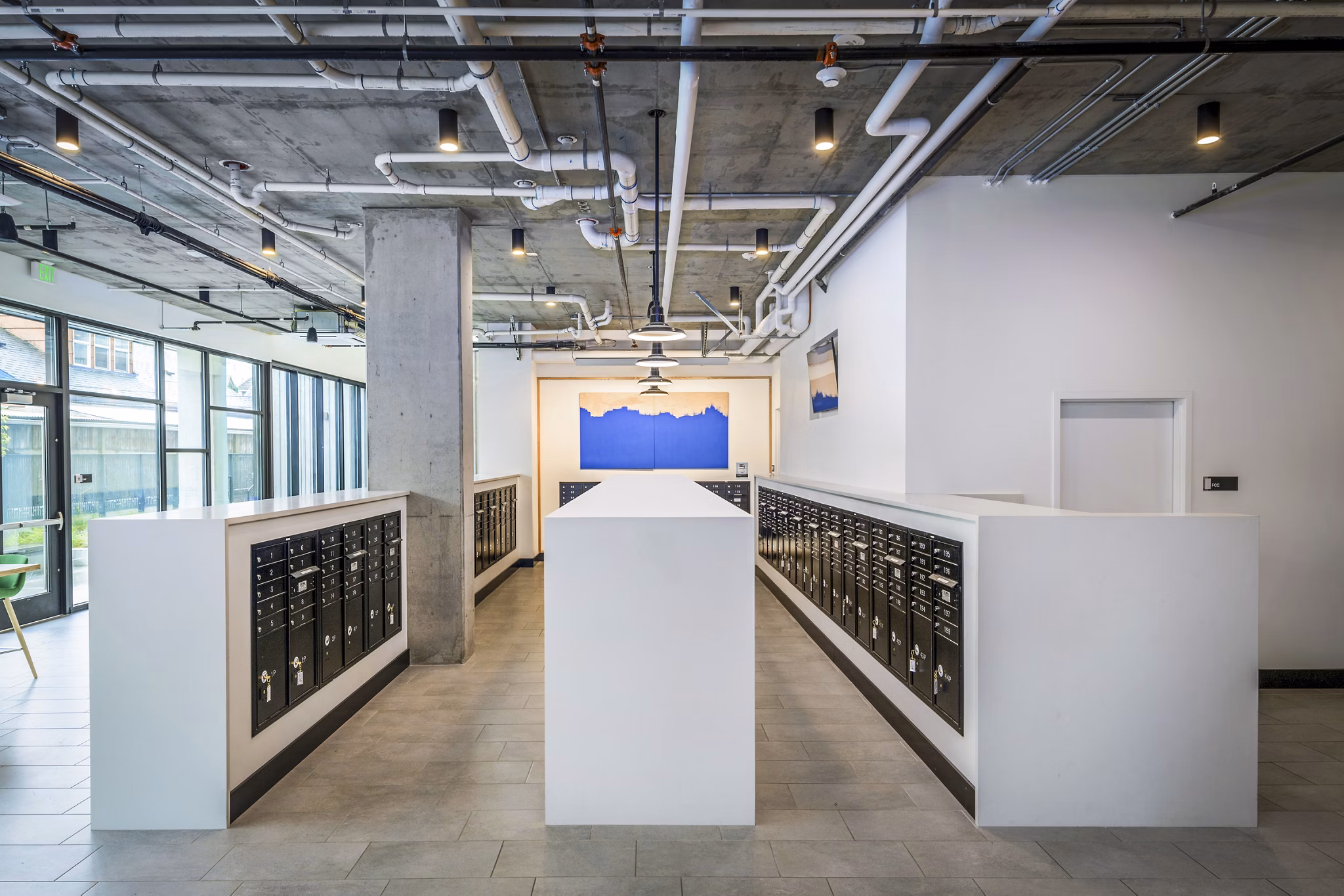 Clubhouse mail room with secure parcel lockers at Union on Broadway Apartments, ideal for residents seeking convenient package management