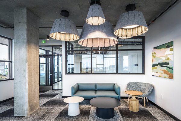 Clubhouse lobby featuring modern decor and seating areas at Union on Broadway Apartments