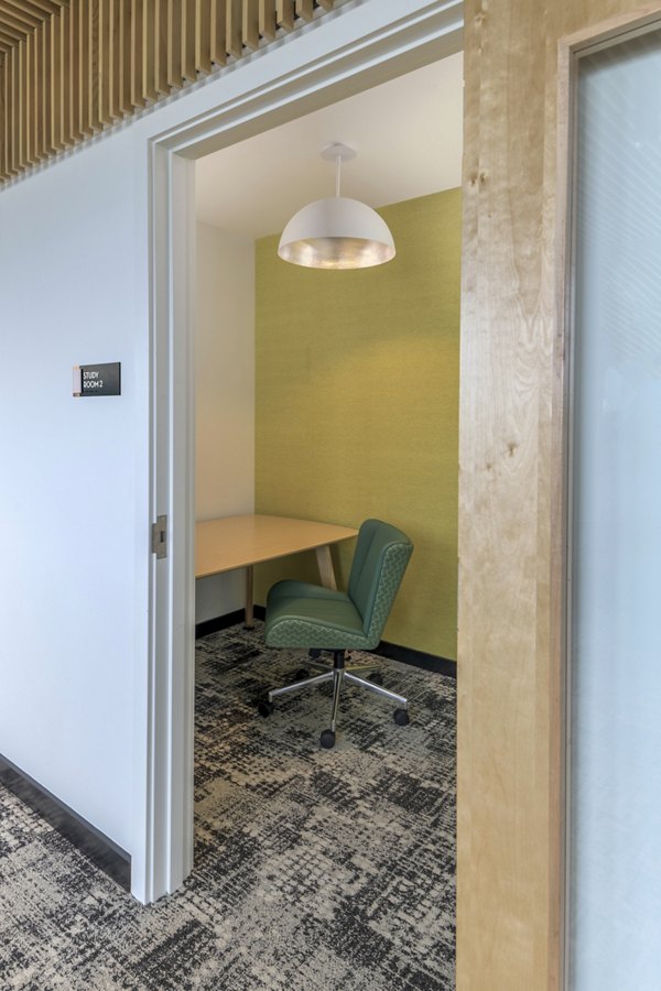 Clubhouse study area with modern design at Union on Broadway Apartments