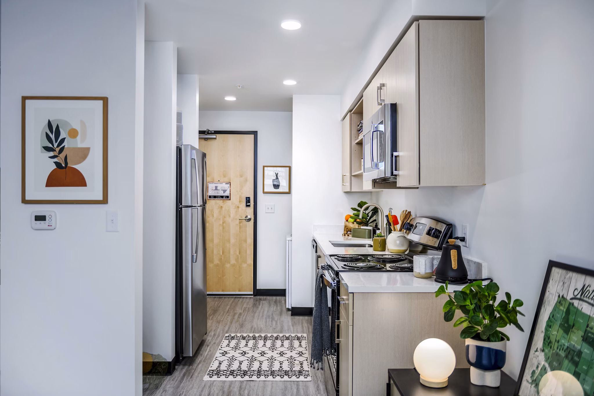 Spacious kitchen with modern appliances at Union on Broadway Apartments