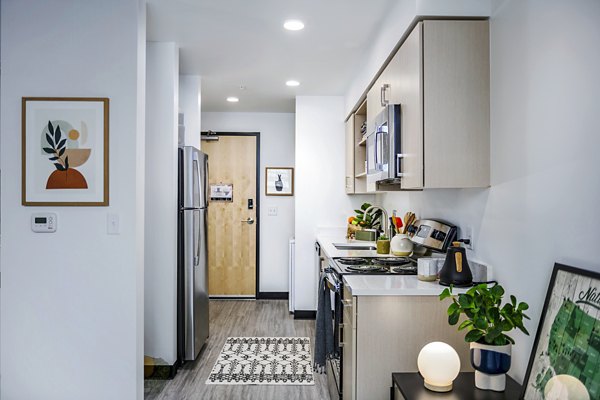 Spacious kitchen with modern appliances at Union on Broadway Apartments