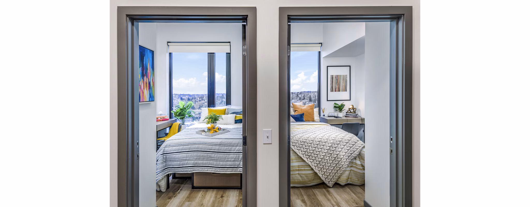 Bedroom with elegant furnishings and soft lighting at The Accolade Apartments