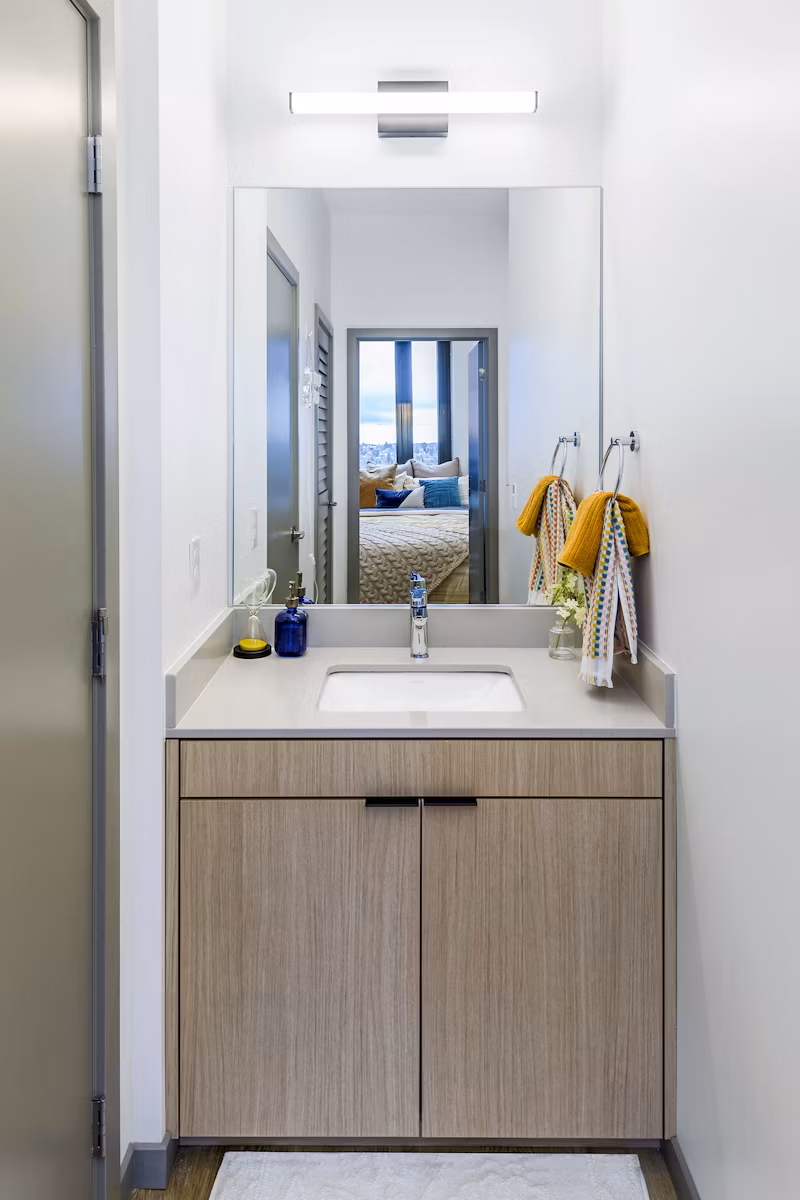Bathroom featuring modern fixtures and sleek design at The Accolade Apartments
