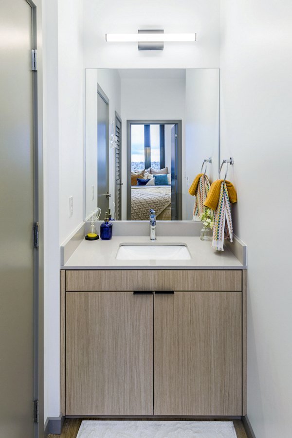 Bathroom featuring modern fixtures and sleek design at The Accolade Apartments