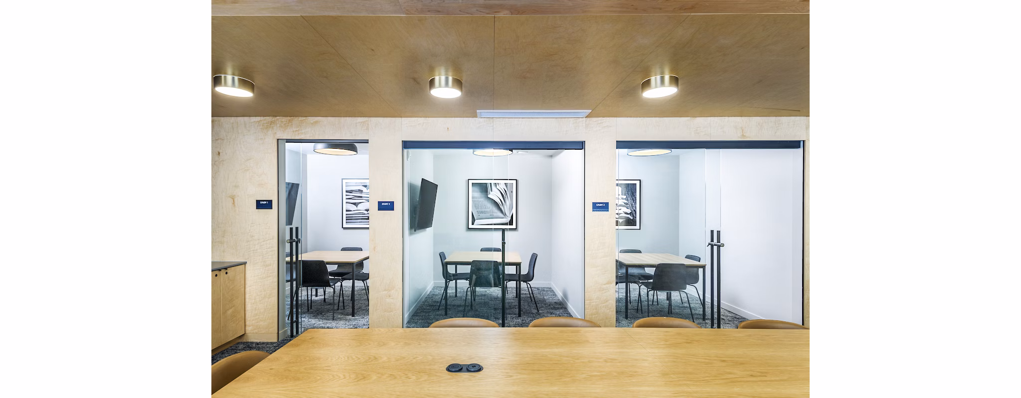 Clubhouse and study area with modern seating at The Accolade Apartments