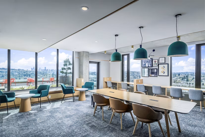 Clubhouse study area with modern furniture and bright lighting at The Accolade Apartments Perfect for focused work and community gatherings