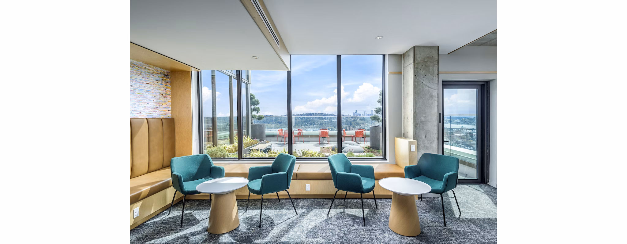 Clubhouse study area with modern decor and cozy seating at The Accolade Apartments