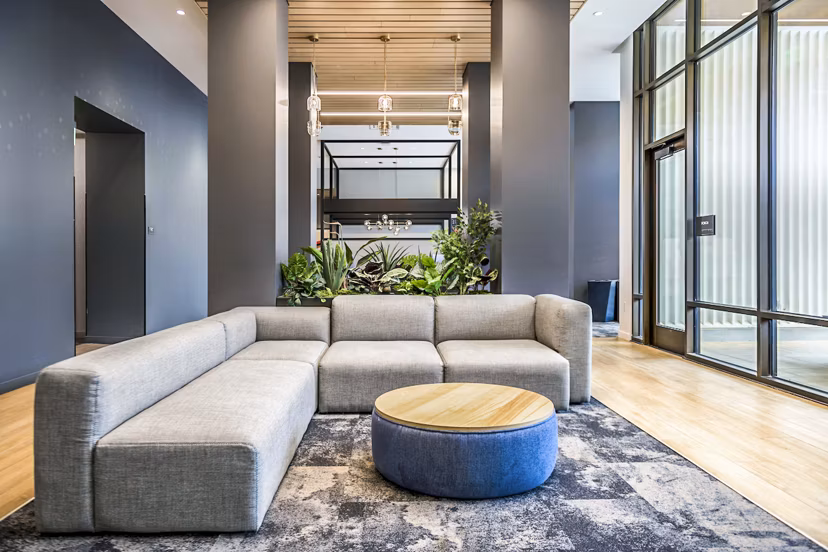 Stylish clubhouse lobby with modern decor at The Accolade Apartments, offering a luxurious living experience in the heart of the city