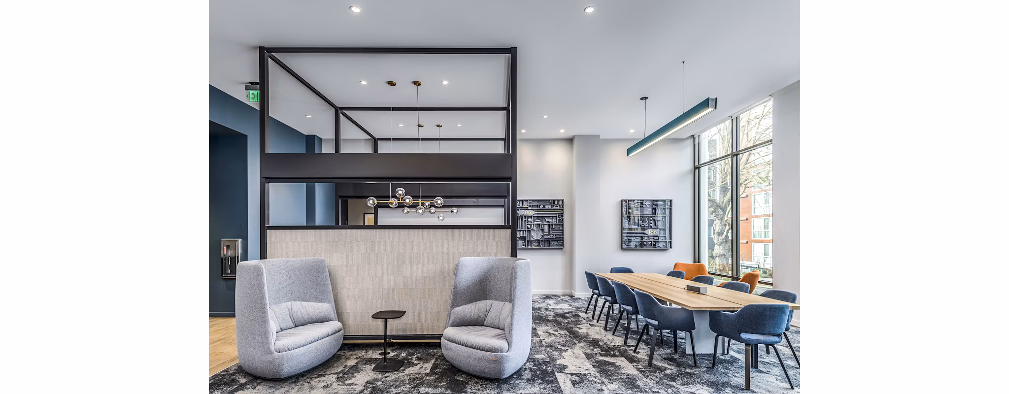 Clubhouse lobby featuring modern seating and natural light at The Accolade Apartments